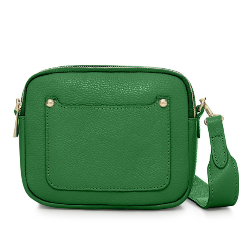 Green leather crossbody bag on a white background