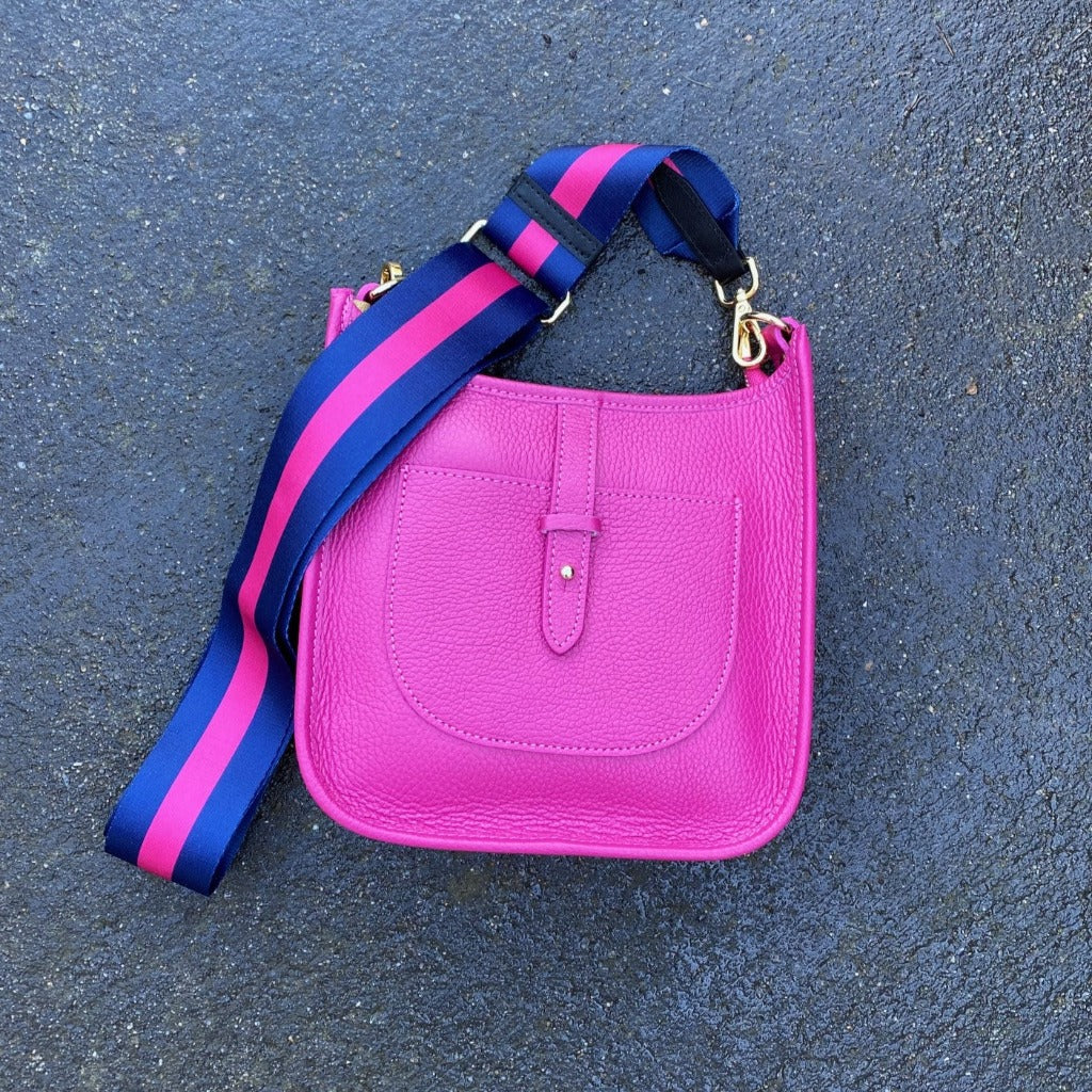 Woman wearing the Loretta bag in pink