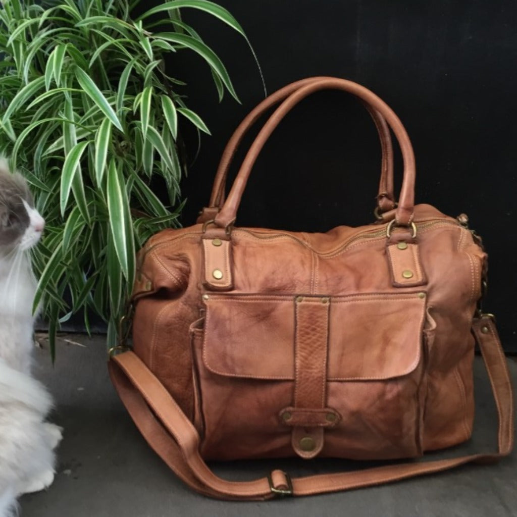 The Page bag in natural leather taken outside