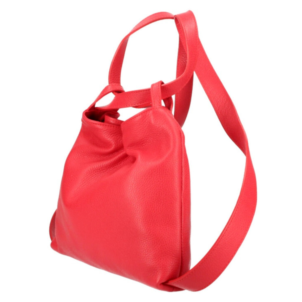 A smaller Italian leather shoulder bag and backpack in red with straps crossed