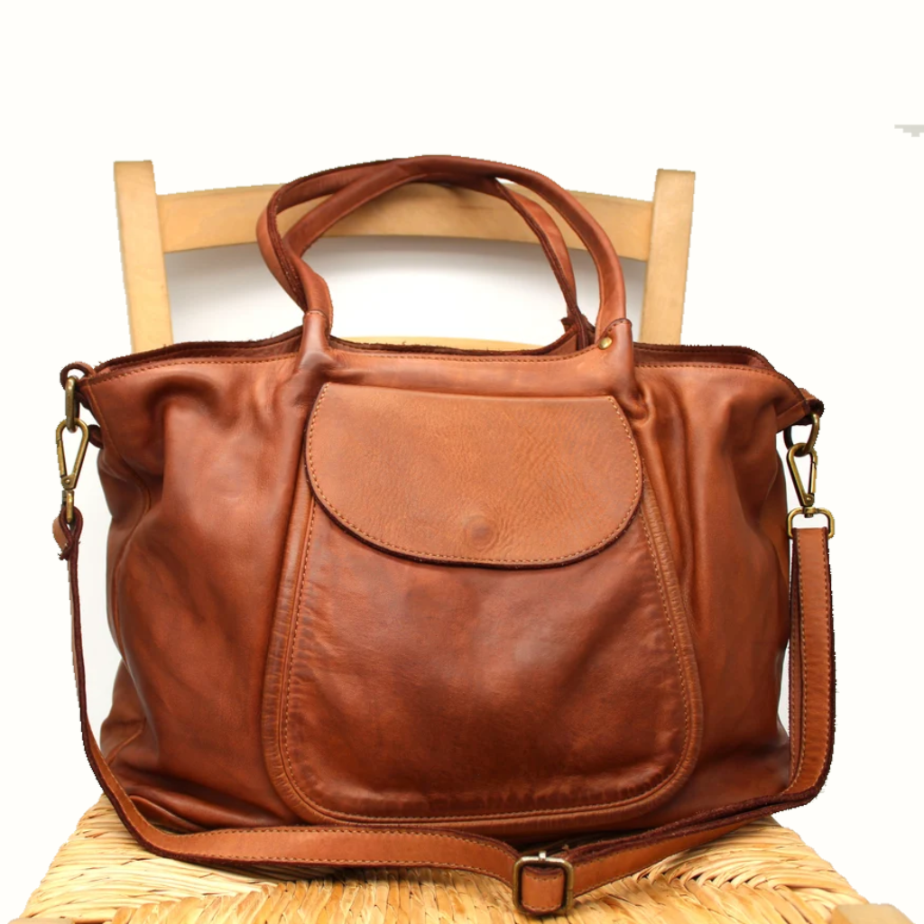 The Ardi bag in sienna on a chair