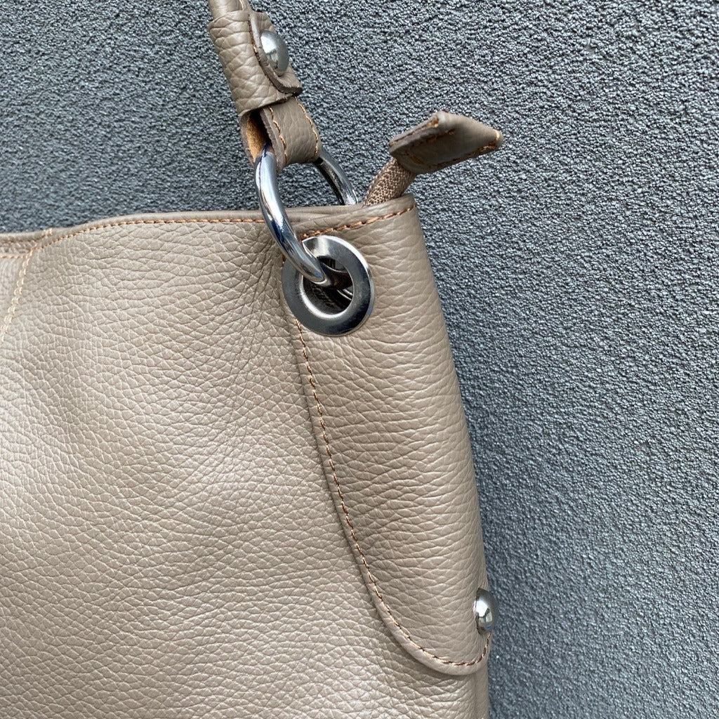 Close up of the Kelli bag in burlywood or taupe
