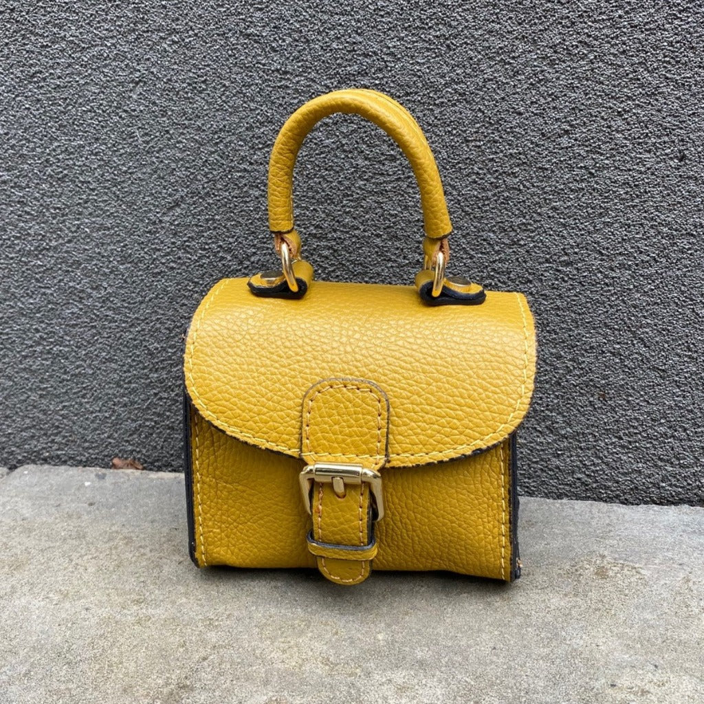 Myla bag in gold or mustard yellow