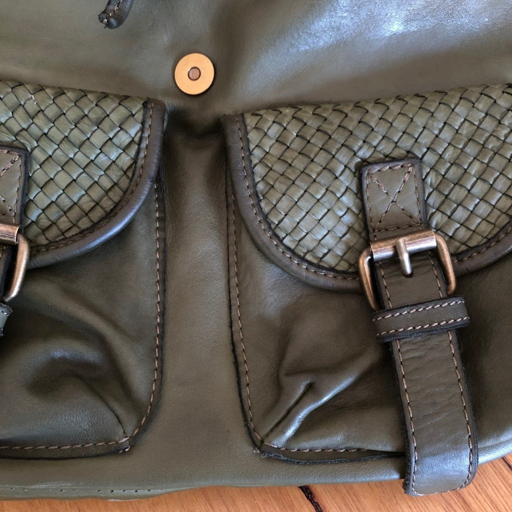 Close up view of the Orthello bag in olive