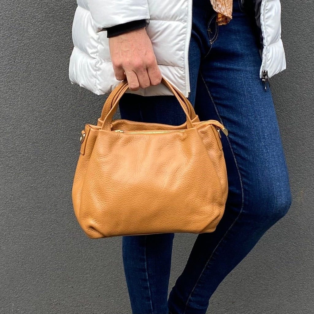 Woman holding the Paris bag