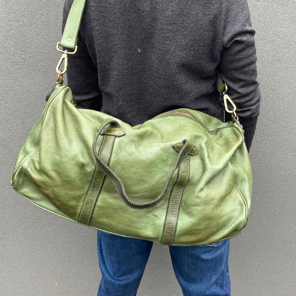 Man with the Raymond bag over his back