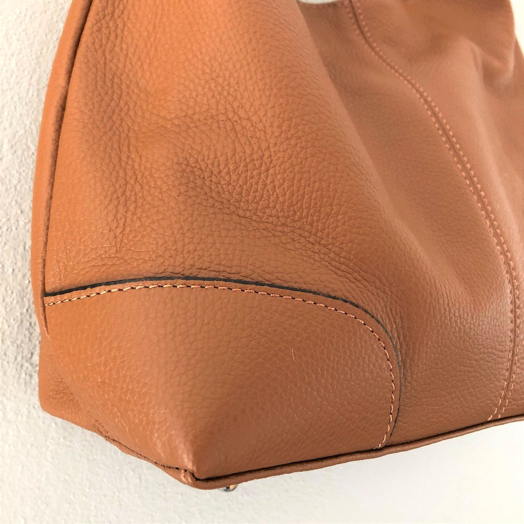 Close up view of the Sarah bag in tan or cognac