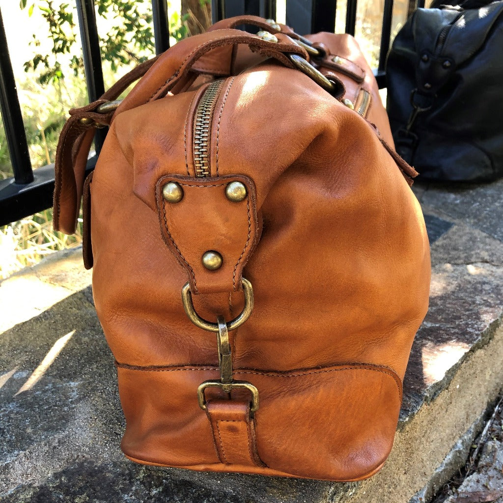 Side view of the Tori vintage bag in natural