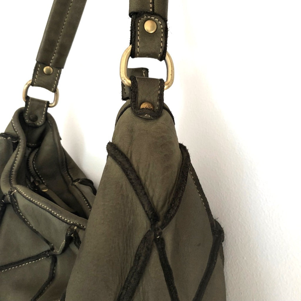 Close up view of the olive Clarissa vintage bag