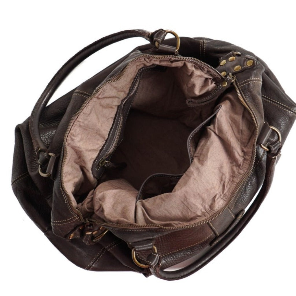 The inside of the Page bag in dark brown