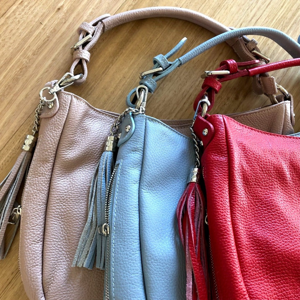 The Elsa bag in powderpuff, light blue and red