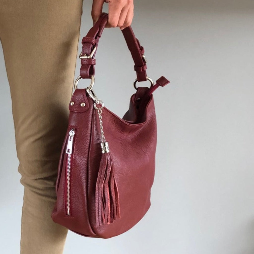 Woman holding the Elsa bag