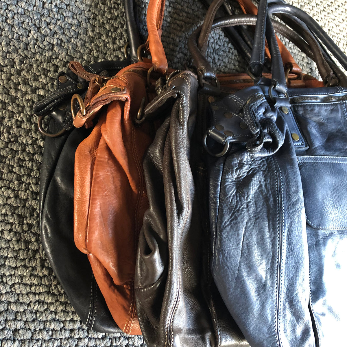 Photo showing the Page bag in various colours