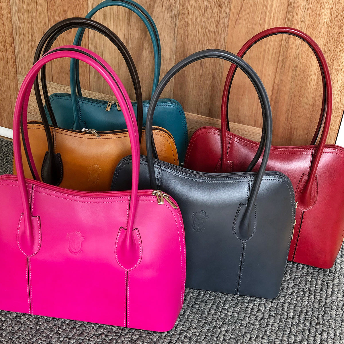 another photo ahowung Dinatello bags in various colours