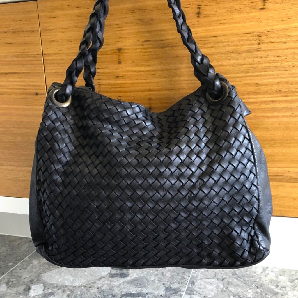 Another photo showing the Izzy vintage bag in black