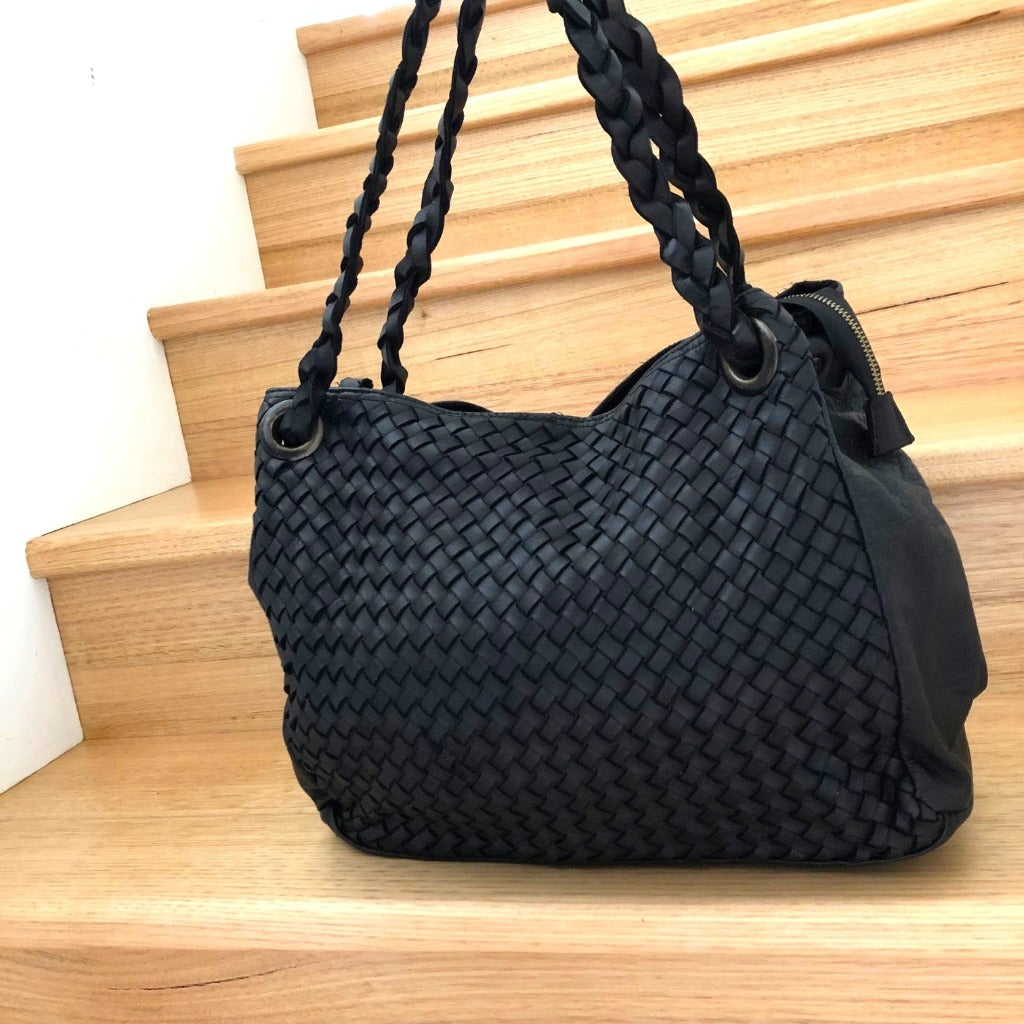 Izzy bag sitting on the stairs