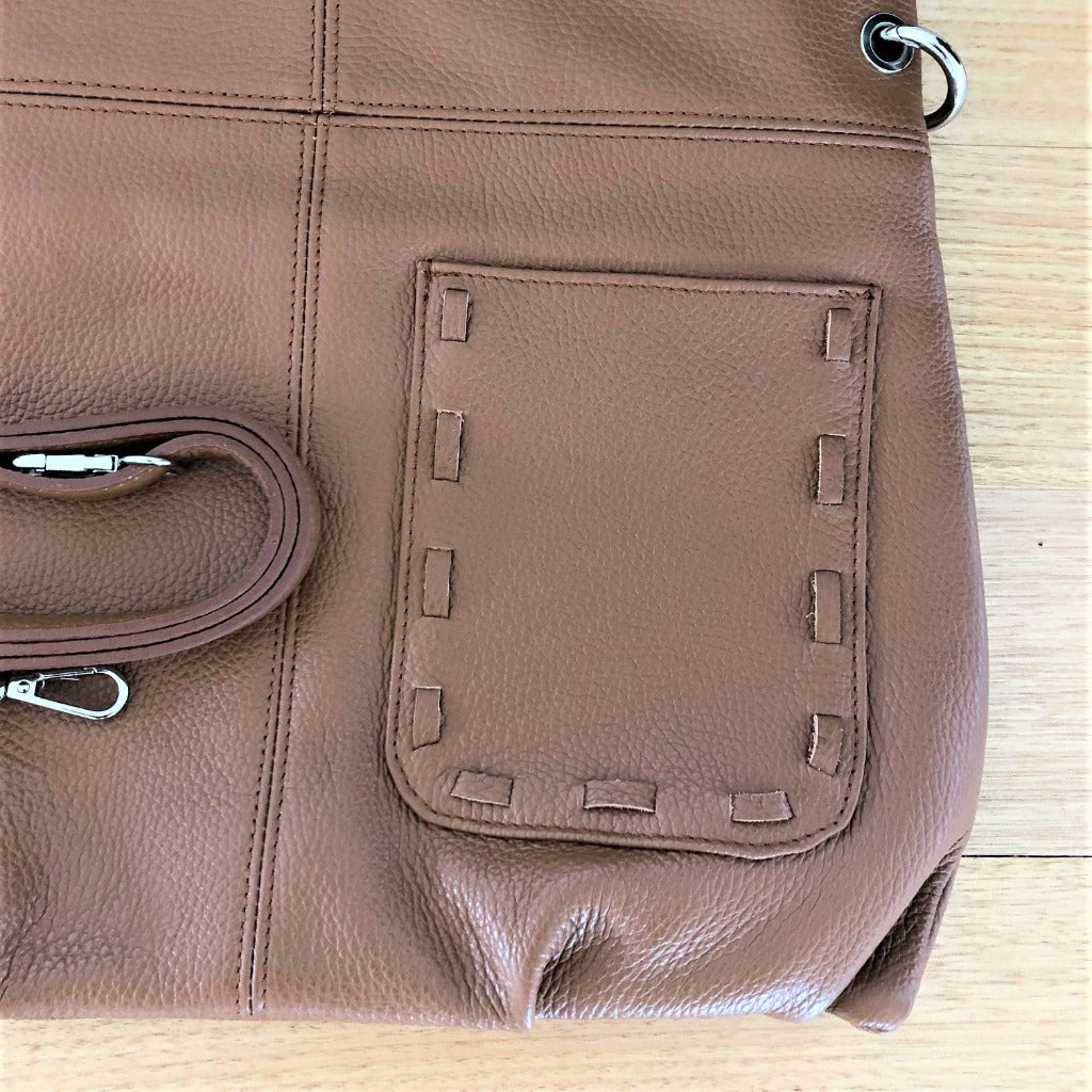 Close up view of the Kate bag in cognac