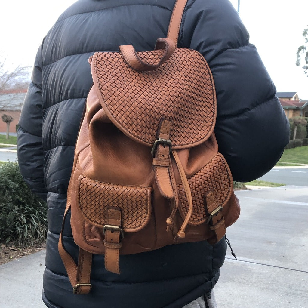 man wearing the Orthello backpack