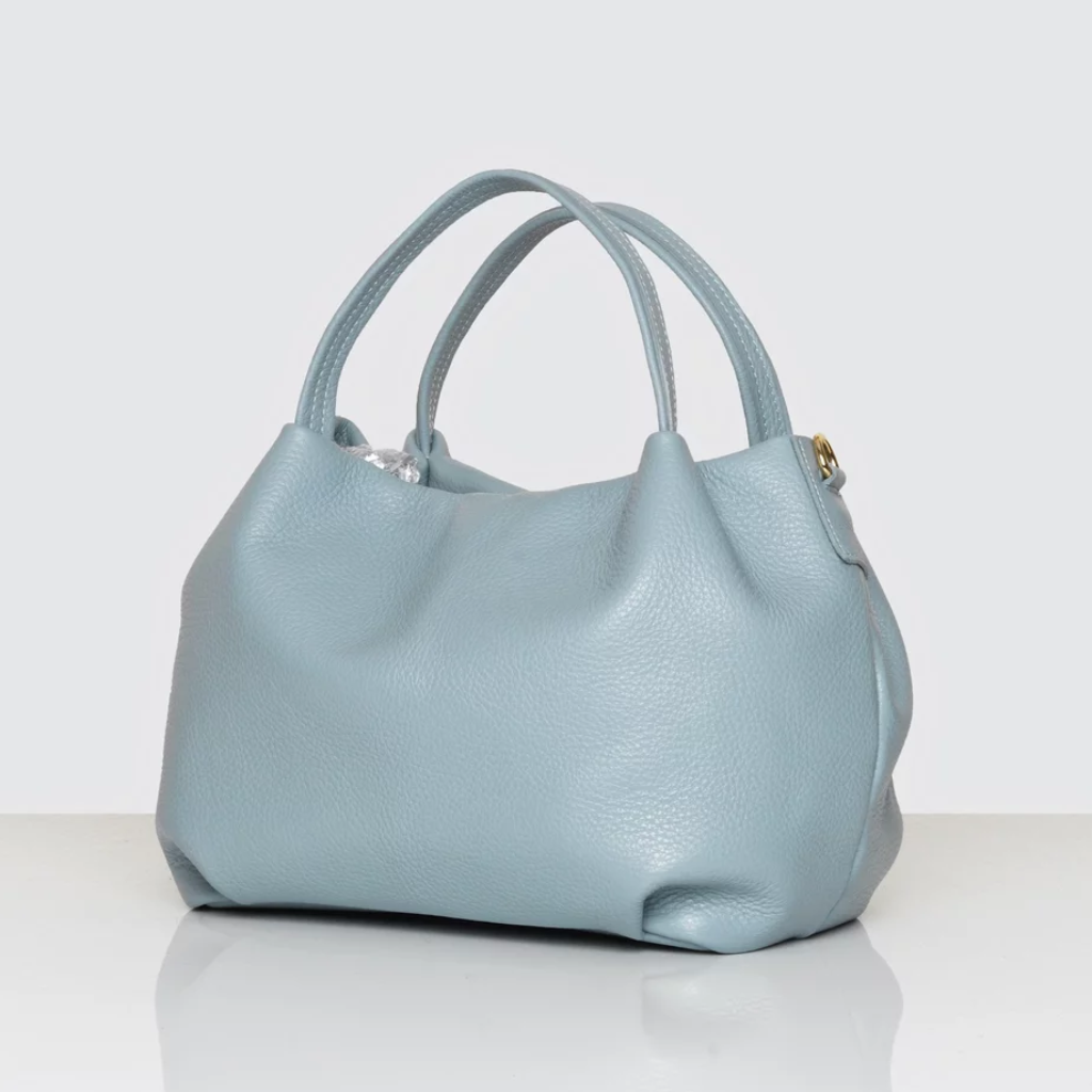 side view of the Paris bag in light blue