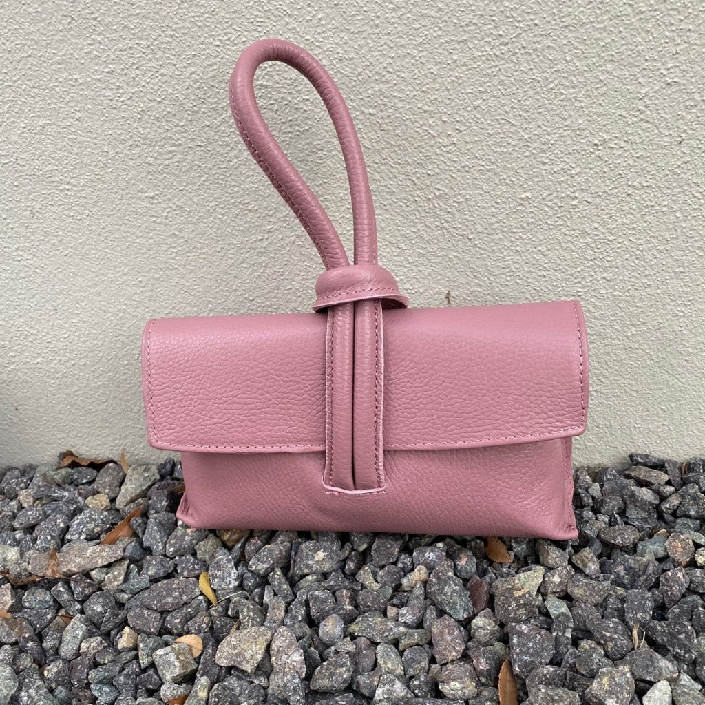 Rachelle clutch in light pink taken outside
