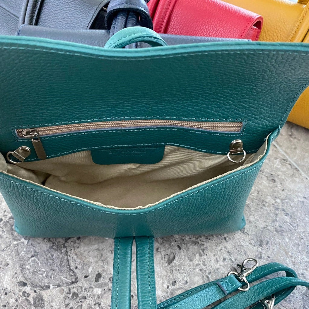 Photo showing the inside of the Rachelle clutch in seagreen