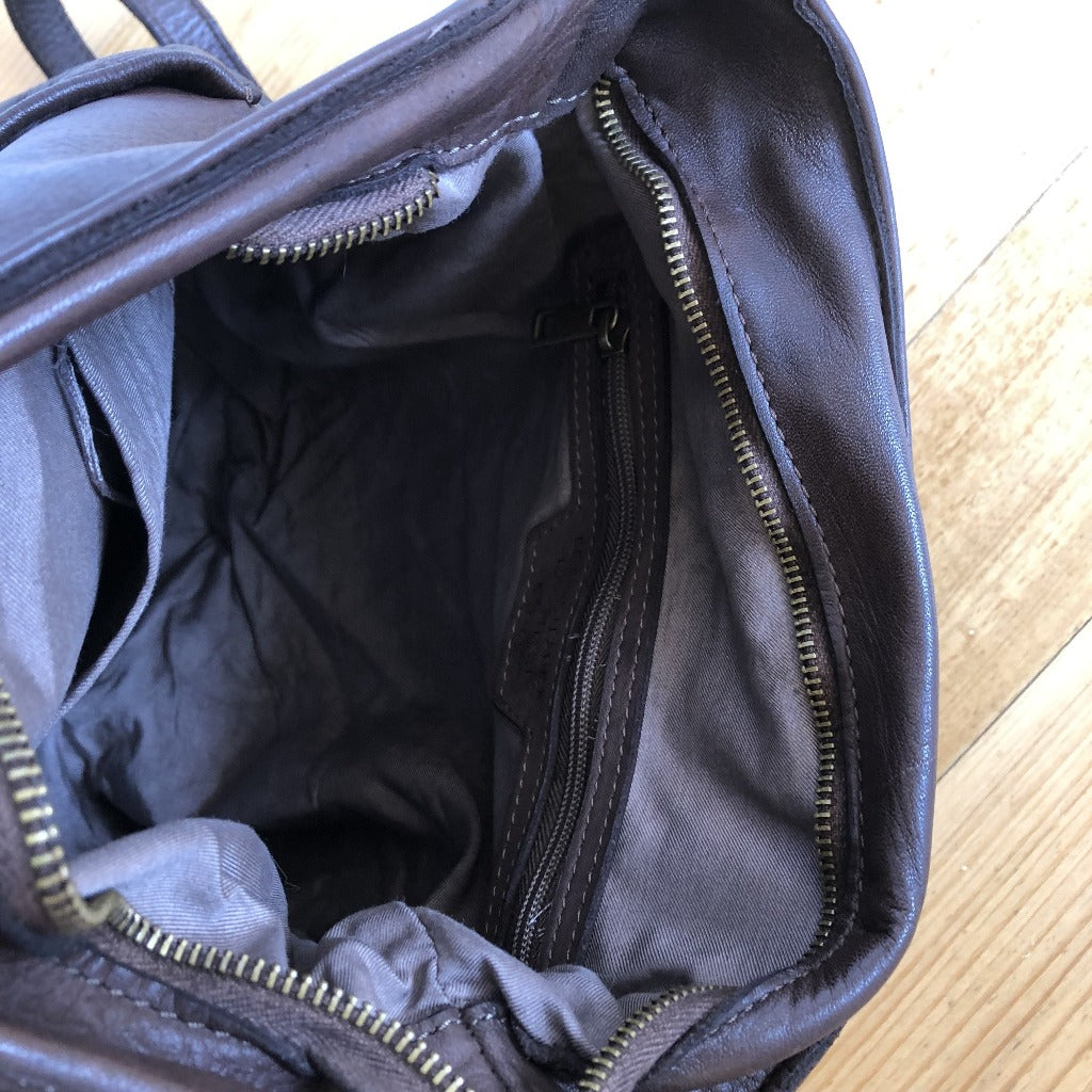 Inside view of the Tyra backpack in dark brown